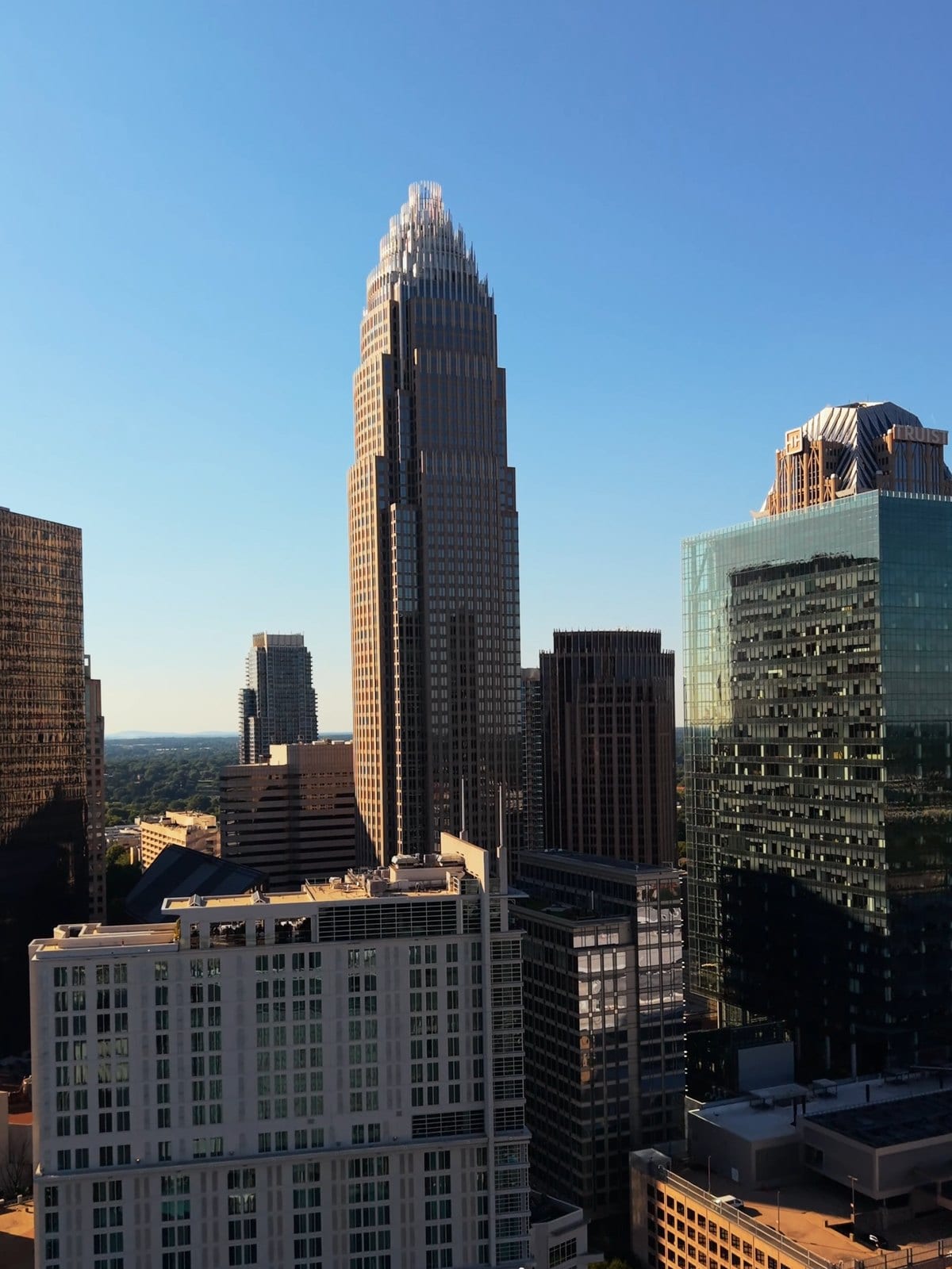 The uptown Charlotte skyline under a clear sky, a short drive north of Fort Mill