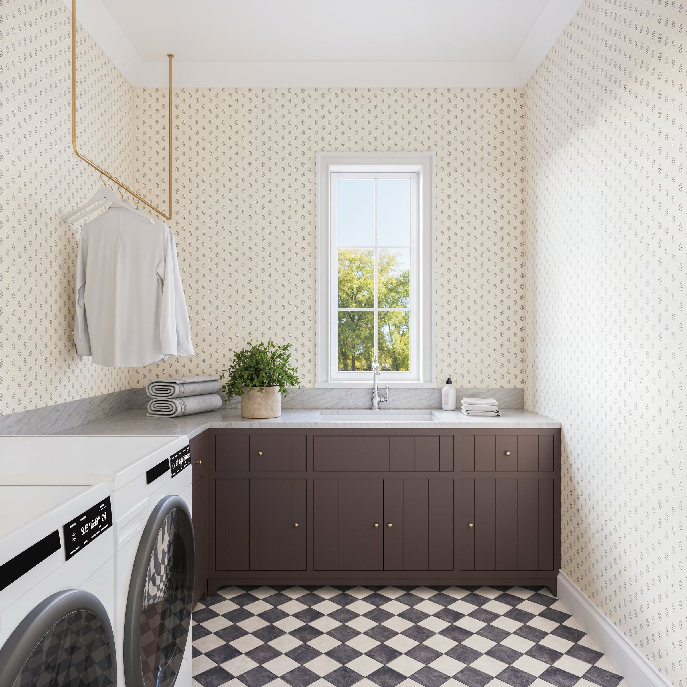 Laundry room at Stone Hollow Cottage with custom cabinetry and a patterned floor