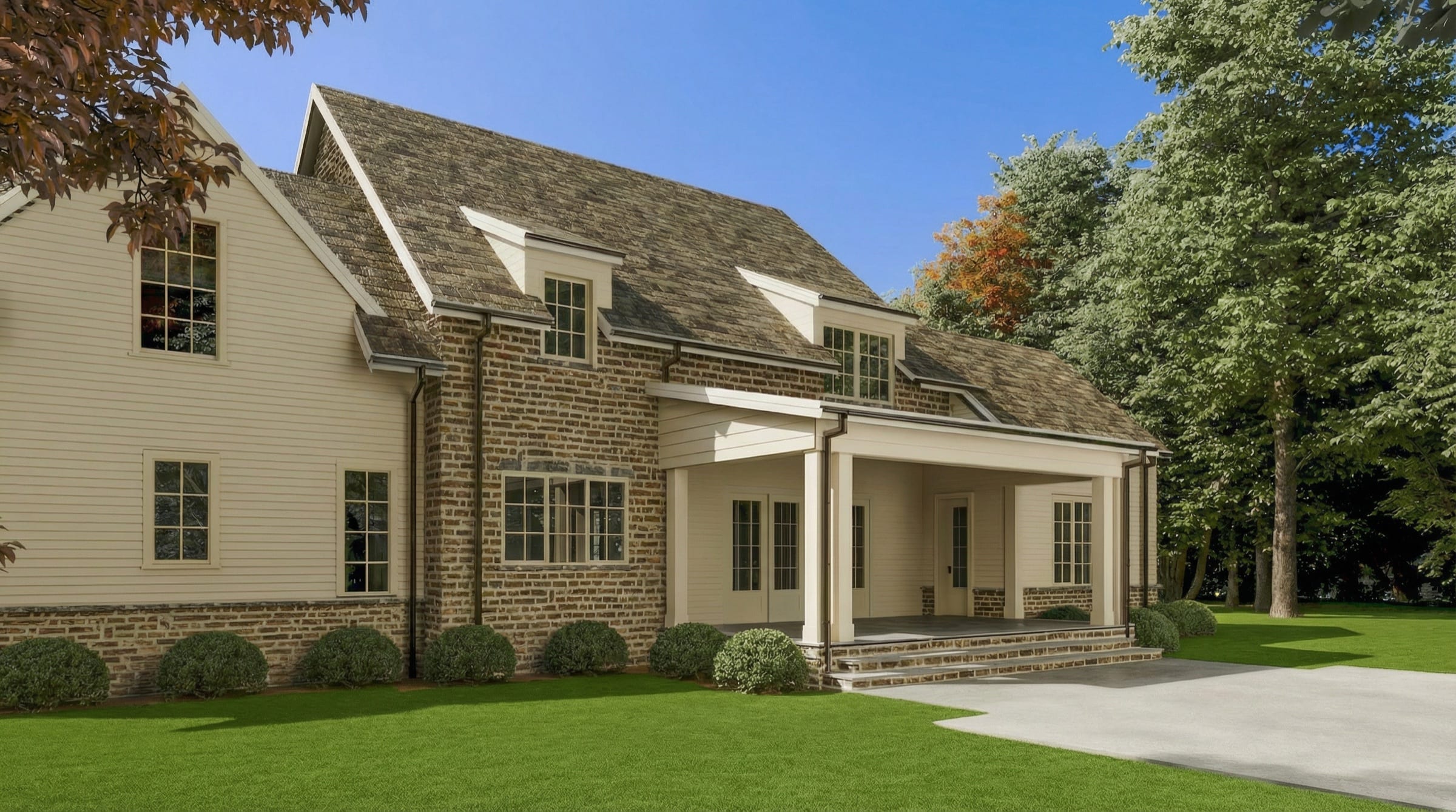 An open rear lawn and covered porch at Wilson Farm